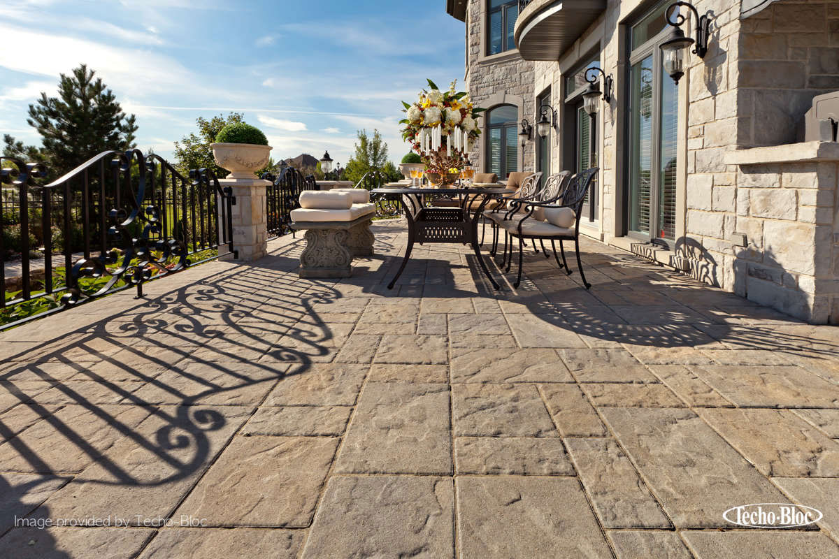 Stone patio with table and chairs